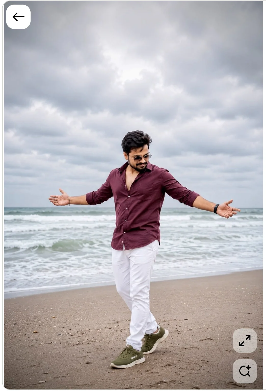 Man with Arms Spread on Overcast Beach